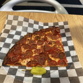 Novel Pizza Cafe - Pizza Near Me - Chicago, Illinois Novel Pizza Cafe - Pizza Near Me - Chicago, Illinois