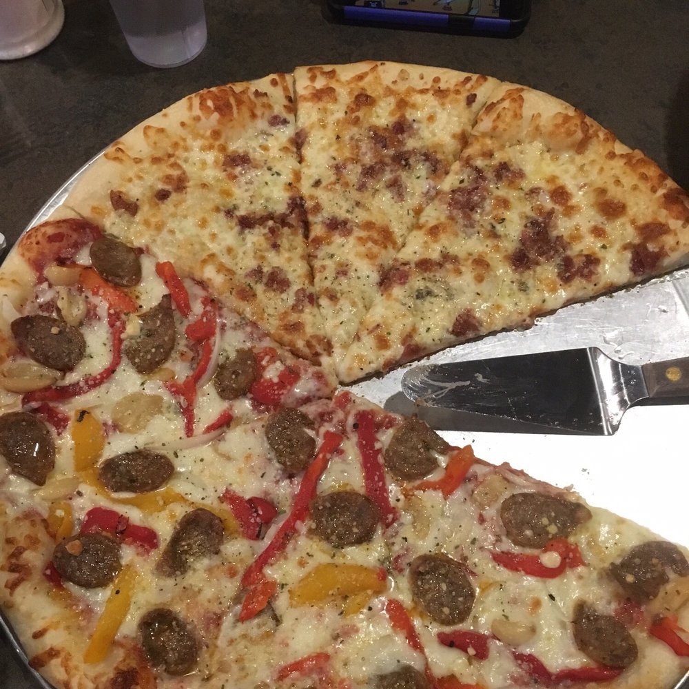 Mezza Luna Pizzeria - Great pizza, the boot and 4-friends with bacon. - Pizza Near Me - Eugene, Oregon Mezza Luna Pizzeria - Great pizza, the boot and 4-friends with bacon. - Pizza Near Me - Eugene, Oregon
