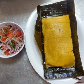 kanka's Cuisine - a fish wrapped in a banana leaf - Peruvian Near Me - Tampa, Florida kanka's Cuisine - a fish wrapped in a banana leaf - Peruvian Near Me - Tampa, Florida