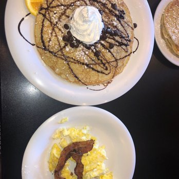 The Pancakery - The Chocolatier pancake, scrambled eggs, and bacon. - Breakfast & Brunch Near Me - Destin, Florida