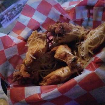 In Cahoots - Garlic parmesan wings. Yummy!! - Pubs Near Me - Bradenton, Florida