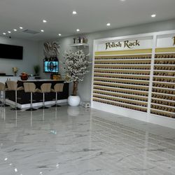 Allure Nail Lounge - Nail Polish and complimentary beverage bar.