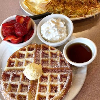 Mil’s Diner - BOMB waffles with strawberries and whipped cream on the side, wife had the London Broiler plate! - Diners Near Me - Milpitas, California Mil’s Diner - BOMB waffles with strawberries and whipped cream on the side, wife had the London Broiler plate! - Diners Near Me - Milpitas, California