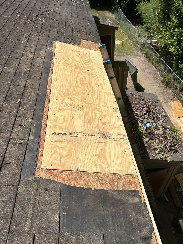 Slide of ADM Roofing