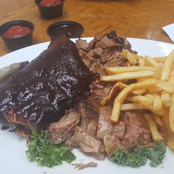 Red Lion - Ribs and brisket platter - Bars Near Me - Vail, Colorado Red Lion - Ribs and brisket platter - Bars Near Me - Vail, Colorado
