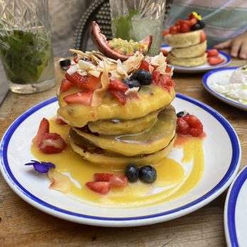 Cremat 11 - The passion fruit gluten free pancakes. Amazing! The glaze/reduction was fabulous. The gluten free pancakes were excellent. - Breakfast & Brunch Near Me - Barcelona, B Cremat 11 - The passion fruit gluten free pancakes. Amazing! The glaze/reduction was fabulous. The gluten free pancakes were excellent. - Breakfast & Brunch Near Me - Barcelona, B