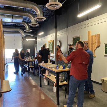 Class Axe Throwing - Section in front the booths. BYOB, trophy's for games we played - Axe Throwing Near Me - Austin, Texas
