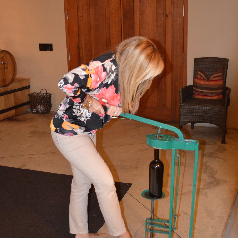 Conn Creek Winery - The last part...adding the cork to your very own bottle - Wineries Near Me - St. Helena, California Conn Creek Winery - The last part...adding the cork to your very own bottle - Wineries Near Me - St. Helena, California