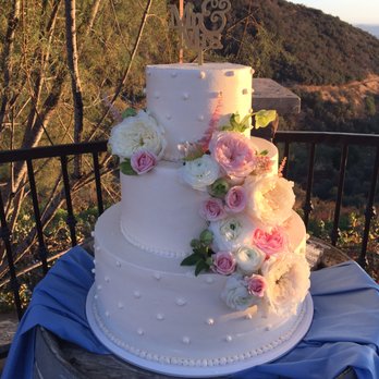 Michelle's - Our delicious and beautiful wedding cake (flowers were put on by my florist.) - Bakeries Near Me - Redlands, California