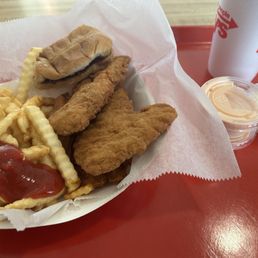 Chicken fingers and crinkle fries. Chicken fingers and crinkle fries.