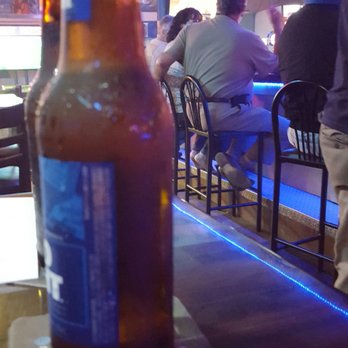 Two Buks Saloon - people sitting at a bar - Sports Bars Near Me - Clearwater, Florida