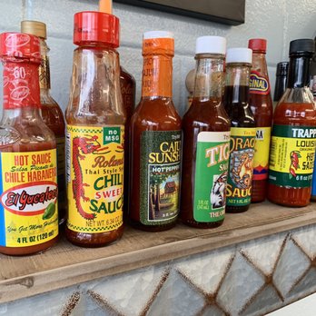 Chums Shrimp Shack - Many different hot sauces so you don't have to bring your own! - Seafood Near Me - St. Charles, Illinois