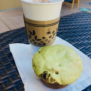 Linnaea's Cafe - Vegan Blueberry matcha green tea muffin with a chai latte in back. - Coffee & Tea Near Me - San Luis Obispo, California Linnaea's Cafe - Vegan Blueberry matcha green tea muffin with a chai latte in back. - Coffee & Tea Near Me - San Luis Obispo, California