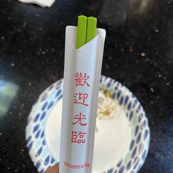Champa Kitchen - a person holding a chopstick in their hand - Vietnamese Near Me - San Jose, California Champa Kitchen - a person holding a chopstick in their hand - Vietnamese Near Me - San Jose, California