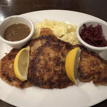 Schnell's Brauhaus - Veal Schnitzel with sauerkraut mashed potatoes and hunters gravy - German Near Me - Palatine, Illinois