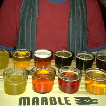 Marble Brewery - Two sample trays (shared by a couple people) and two thumbs up for Mable beers. Excellent beer in several styles! - Breweries Near Me - Albuquerque, New Mexico