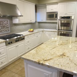 Bee Green Electric - Replace undercabinet fixtures with low energy LED dimmable fixtures.