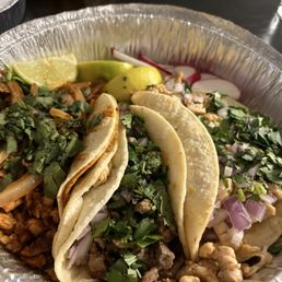 Chipotle chicken taco, taco authentico w/ steak, last one on the right is chicken and corn taco Chipotle chicken taco, taco authentico w/ steak, last one on the right is chicken and corn taco