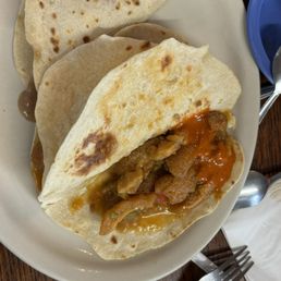 Chicharrones en salsa & one carne guisada breakfast tacos... Chicharrones en salsa & one carne guisada breakfast tacos...