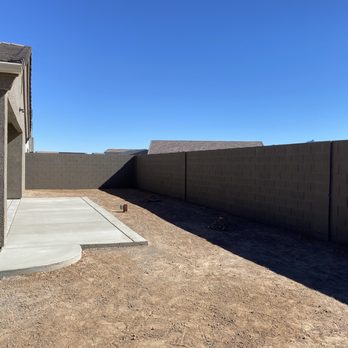 Above Standard Custom Painting - Concrete block wall after priming and painting. - Painters Near Me - Kingman, Arizona