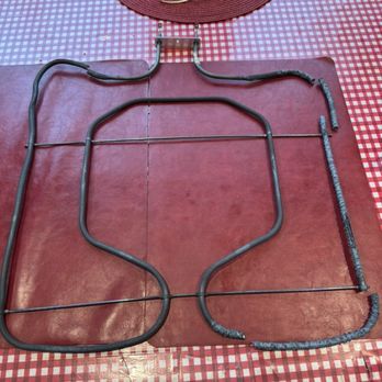 Sears Appliance Repair - The lower heating element. Note the destroyed Right side compared to the left side. - Appliances & Repair Near Me