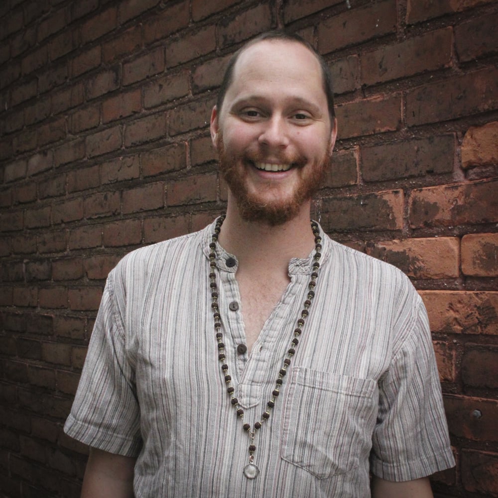 Trevor Eller Massage Therapist & Yoga Logo