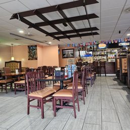 A wide angle view of the inside of the restaurant. A wide angle view of the inside of the restaurant.