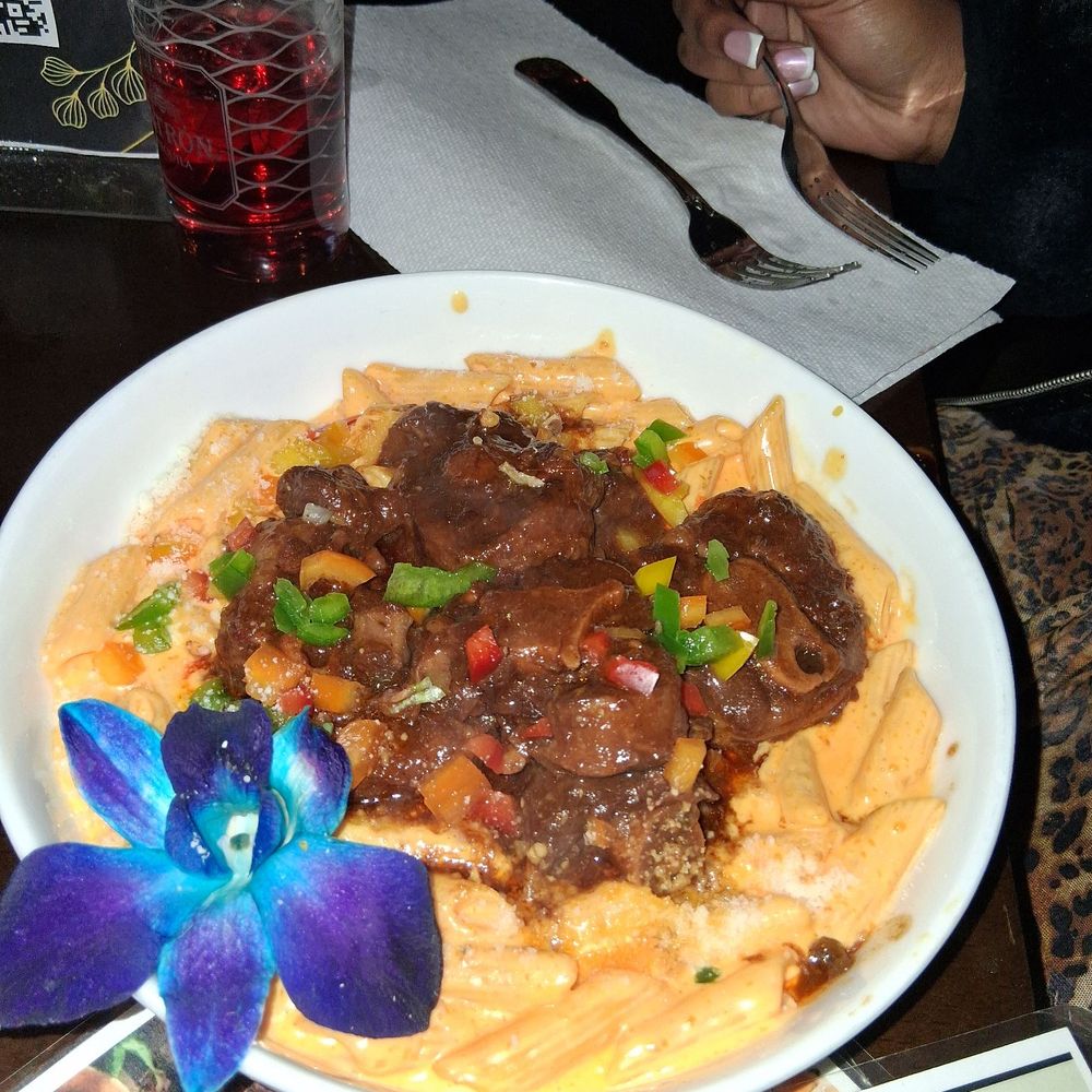 The 6 - Oxtail over rasta pasta 7.5/10 - Caribbean Near Me - The Bronx, New York