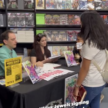 Tate's Comics - Fans line up for a signed copy of Ulrius Jewels featuring the first appearances of the all new Amphoman and Charley. - Comic Books Near Me - Lauderhill, Florida