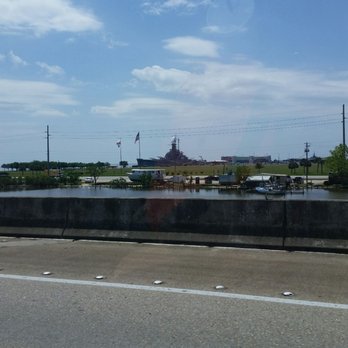 George Wallace Tunnel - Battle ship to your right, shortly after exiting the tunnel - Landmarks & Historical Buildings Near Me - Mobile, Alabama