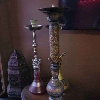Dijla Cafe & Lounge - two candles on a table - Hookah Bars Near Me - Decatur, Georgia