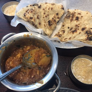 Royal Biryani - Cauliflower curry with potato, naan bread, and dessert (wheat noodle, milk, and sugar). - Indian Near Me - Charlotte, North Carolina Royal Biryani - Cauliflower curry with potato, naan bread, and dessert (wheat noodle, milk, and sugar). - Indian Near Me - Charlotte, North Carolina