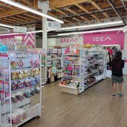 Daiso - Toiletries and snacks near the register.