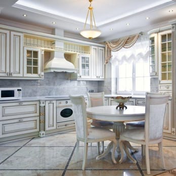 Martin Construction Remodeling - a kitchen with a table and chairs - General Contractors Near Me Martin Construction Remodeling - a kitchen with a table and chairs - General Contractors Near Me