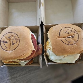 Napoletano Brothers - This is the Three meats breakfast sandwich on the left and the porchetta breakfast sandwich on the right. - Italian Near Me - Springfield, Pennsylvania Napoletano Brothers - This is the Three meats breakfast sandwich on the left and the porchetta breakfast sandwich on the right. - Italian Near Me - Springfield, Pennsylvania