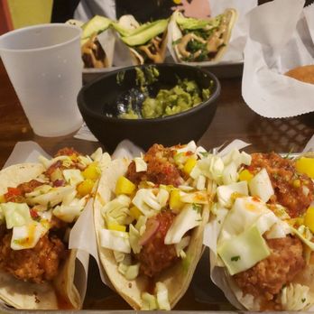 Tiki Taco - Coconut shrimp tacos, kalbi beef tacos, and the remnants of their delicious guacamole and chips. - Tacos Near Me - Washington, DC, District of Columbia Tiki Taco - Coconut shrimp tacos, kalbi beef tacos, and the remnants of their delicious guacamole and chips. - Tacos Near Me - Washington, DC, District of Columbia