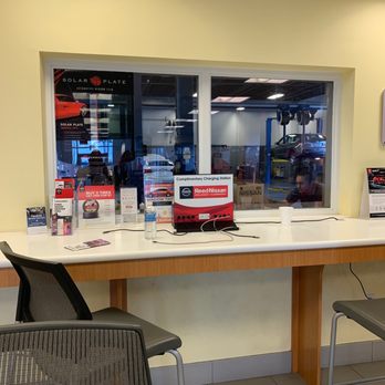 Reed Nissan Clermont - Window looking into shop. - Car Dealers Near Me - Clermont, Florida Reed Nissan Clermont - Window looking into shop. - Car Dealers Near Me - Clermont, Florida