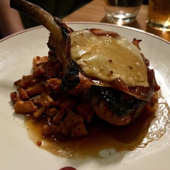Piatti - Pork chop saltimbocca on a bed of spicy squash with crispy pancetta - Italian Near Me - San Antonio, Texas