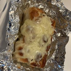 Nonno’s Pizza - Fresh hot garlic knots with mozzarella!