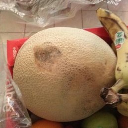 a variety of fruits in a plastic bag a variety of fruits in a plastic bag