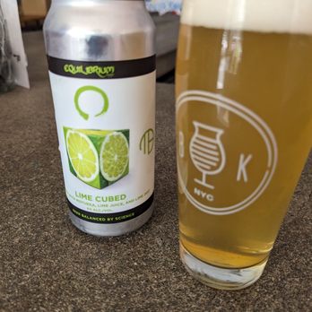 Beer Karma - a can of lime curd next to a glass of beer - Beer Bar Near Me - Brooklyn, New York