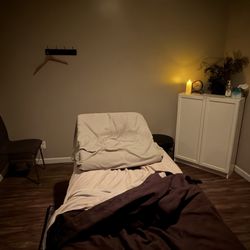 Oasis Massage and Spa - Pregnancy bed--removable cover to make it comfortable for your back as well