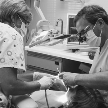 Thomas Siewert,  DDS - Dr. Siewert and hygienist, Kim, working on a patient. - Pediatric Dentists Near Me - South Elgin, Illinois