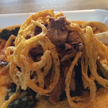 Saw's Soul Kitchen - Pork and greens...possibly the best grits dish I ever ate. - Barbeque Near Me - Birmingham, Alabama
