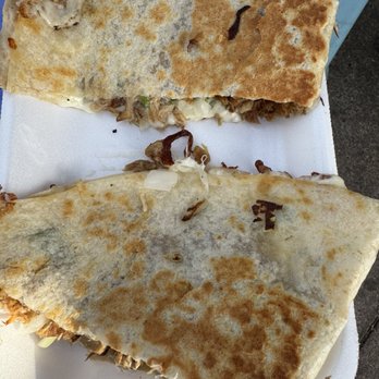 Andy’s Taco Truck - Carnitas quesadillas (half eaten) - Food Trucks Near Me - Westminster, California Andy’s Taco Truck - Carnitas quesadillas (half eaten) - Food Trucks Near Me - Westminster, California