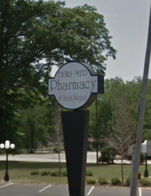 Dura-Med Pharmacy & Soda Shoppe Logo
