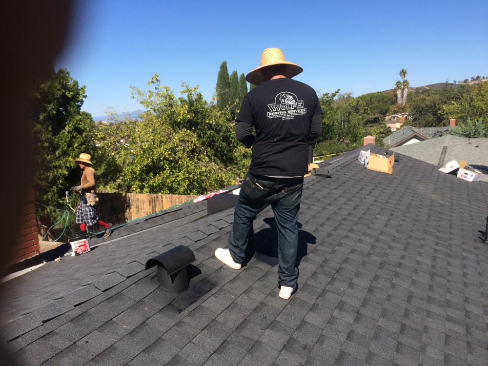 Slide of Wolfe Roofing Company