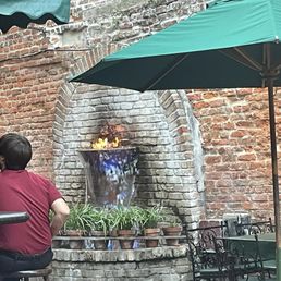 The water fountain with a fire at Pat O'Brien's The water fountain with a fire at Pat O'Brien's