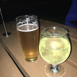 a glass of beer and a glass of lemonade a glass of beer and a glass of lemonade