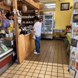 Uppercrust Bakery -  cards, small gifts available in the front window, cold drinks in the cold case.
